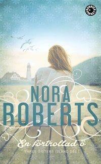En förtrollad ö by Nora Roberts