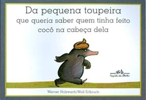 Da pequena toupeira que queria saber quem tinha feito cocô na cabeça dela by Werner Holzwarth