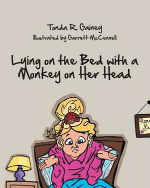 Lying on the Bed with a Monkey on Her Head by Tonda R. Gainey