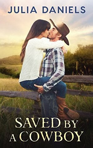 Saved by a Cowboy by Julia Daniels