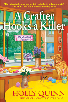 A Crafter Hooks a Killer: A Handcrafted Mystery by Holly Quinn