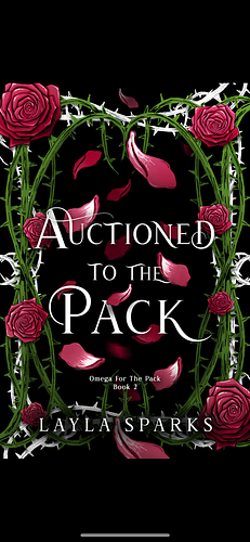 Auctioned to The Pack by Layla Sparks