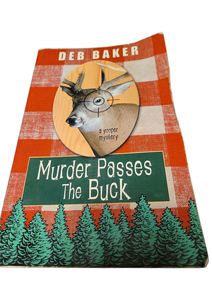 Murder Passes the Buck by Deb Baker