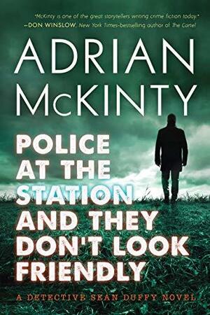 Police at the Station and They Don't Look Friendly by Adrian McKinty