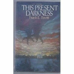 This Present Darkness by Frank E. Peretti