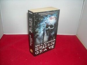 Shallow Grave by Lori G. Armstrong