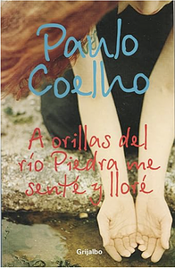 A Orillas del Rio Piedra Me Senté y Lloré by Paulo Coelho