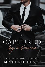 Captured by a Sinner by Michelle Heard