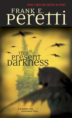 This Present Darkness by Frank E. Peretti