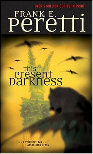 This Present Darkness by Frank E. Peretti