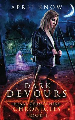 The Dark Devours by April Snow