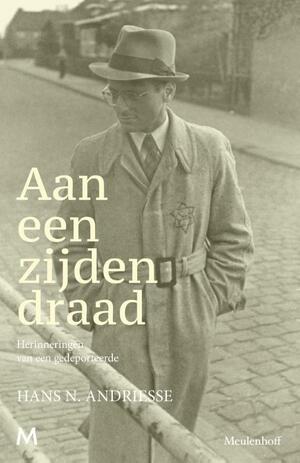 Aan een zijden draad by Hans N. Andriesse