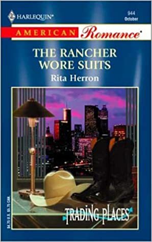 The Rancher Wore Suits by Rita Herron