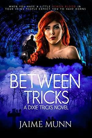 Between Tricks: A Dixie Tricks Novel by Jaime Munn