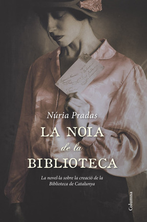 La noia de la biblioteca by Núria Pradas