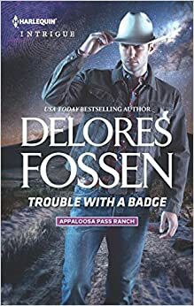 Trouble with a Badge by Delores Fossen