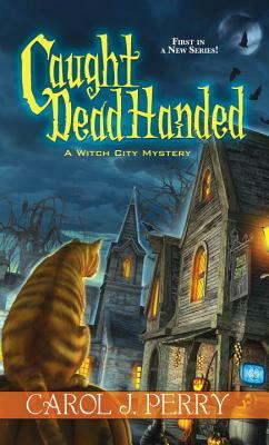 Caught Dead Handed by Carol J. Perry