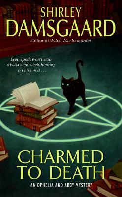 Charmed to Death: An Ophelia and Abby Mystery by Shirley Damsgaard