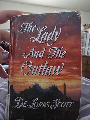 The Lady And The Outlaw by DeLoras Scott