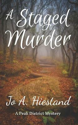 A Staged Murder by Jo A. Hiestand
