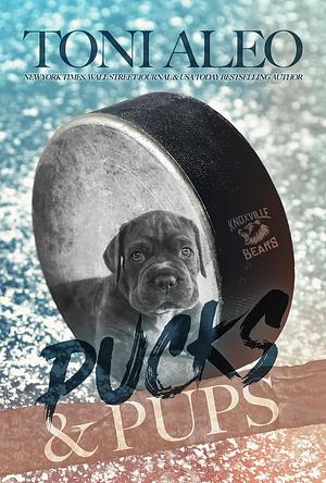 Pucks and Pups by Toni Aleo