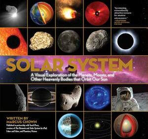 Solar System: A Visual Exploration of All the Planets, Moons and Other Heavenly Bodies That Orbit Our Sun by Marcus Chown