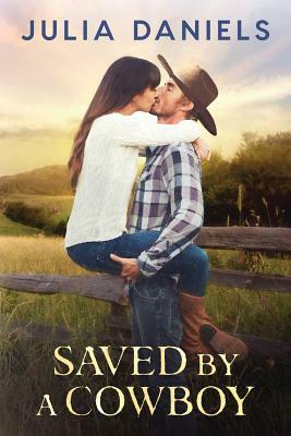 Saved by a Cowboy by Julia Daniels