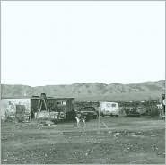 Dogs Chasing My Car in the Desert by John Divola