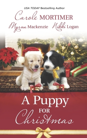 A Puppy for Christmas: On the Secretary's Christmas List / The Soldier, the Puppy and Me / The Patter of Paws at Christmas by Nikki Logan, Carole Mortimer, Myrna Mackenzie