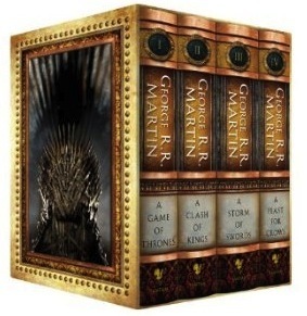 The George R.R. Martin Song Of Ice and Fire Box Set featuring A Game of Thrones, A Clash of Kings, A Storm of Swords, and A Feast for Crows by George R.R. Martin