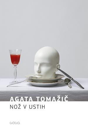 Nož v ustih by Agata Tomažič