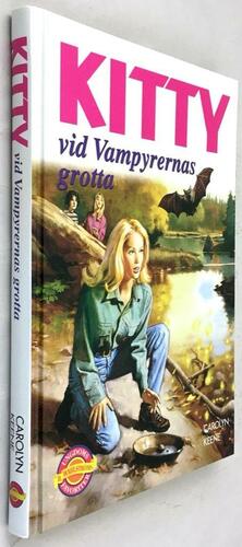 Kitty vid vampyrernas grotta by Carolyn Keene