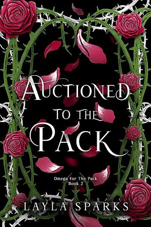 Auctioned to The Pack by Layla Sparks