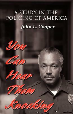 You Can Hear Them Knocking: A Study in the Policing of America by John L. Cooper