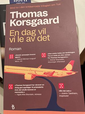 En dag vil vi le av det by Thomas Korsgaard