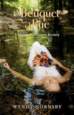 A Bouquet of Rue: A Maggie Macgowen Mystery by Wendy Hornsby