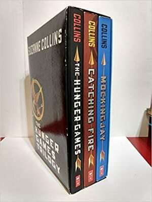 The Hunger Games Trilogy with Pin by Suzanne Collins