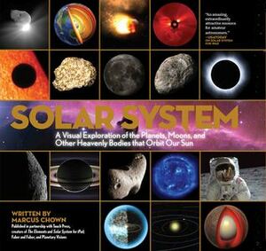 Solar System: A Visual Exploration of All the Planets, Moons and Other Heavenly Bodies that Orbit Our Sun by Marcus Chown
