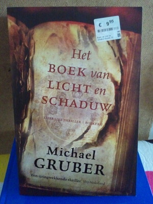 Het boek van licht en schaduw by Michael Gruber, Hugo Kuipers