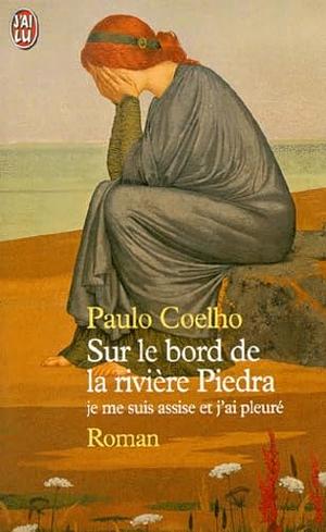 Sur le bord de la rivière Piedra by Paulo Coelho