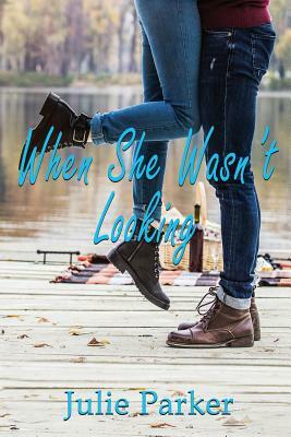 When She Wasn't Looking by Julie Parker