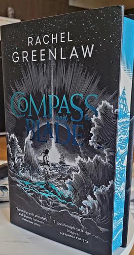 Compass and blade by Rachel Greenlaw