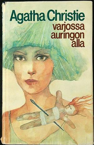 Varjossa auringon alla by Agatha Christie