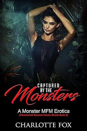 Captured by the Monsters: A Monster MFM Erotica by Charlotte Fox