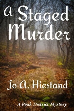 A Staged Murder by Jo A. Hiestand