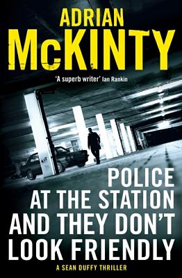 Police at the Station and They Don't Look Friendly by Adrian McKinty