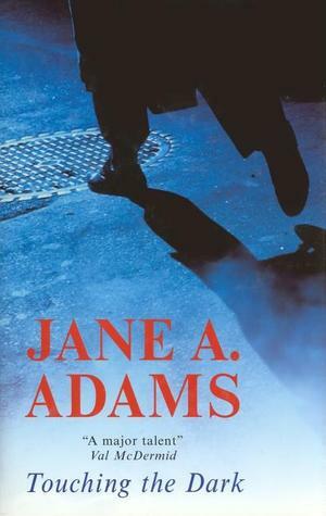 Touching The Dark by Jane A. Adams