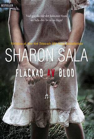 Fläckad av blod by Sharon Sala