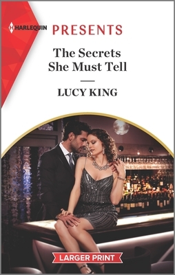 The Secrets She Must Tell by Lucy King