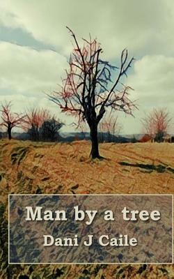 Man by a tree by Dani J. Caile